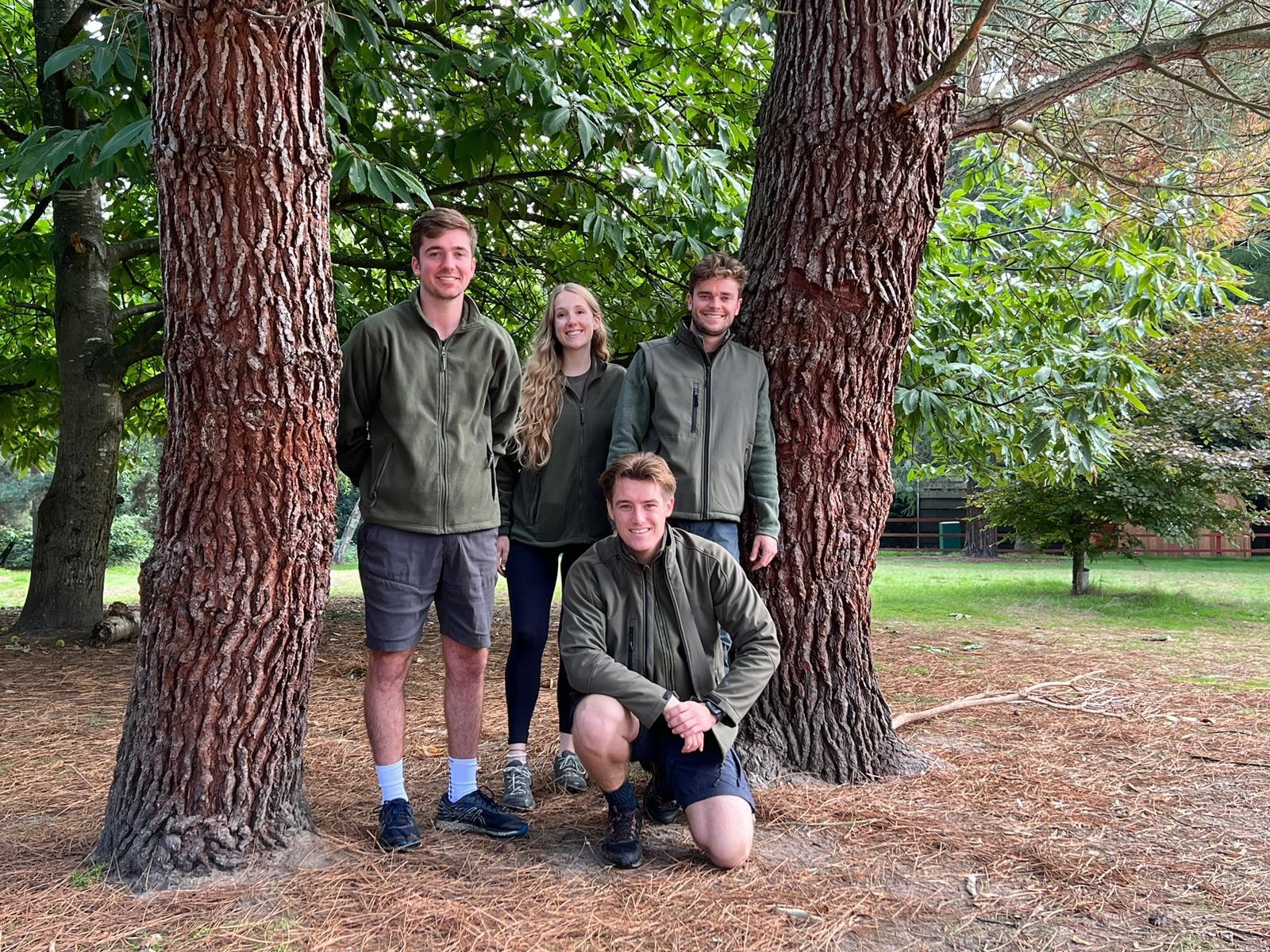 The Rootd team standing in the woods