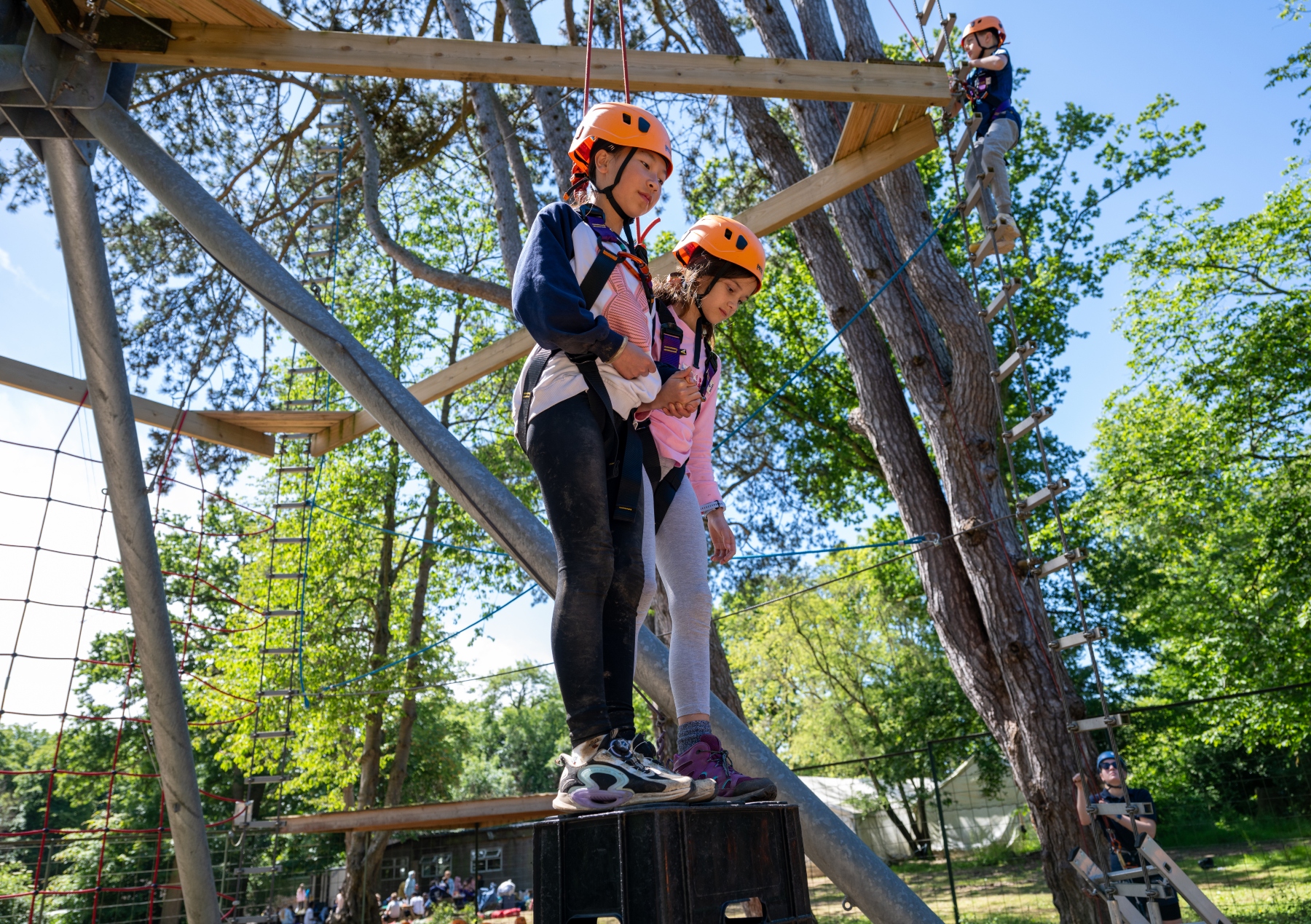 girls climbing on primary school residential