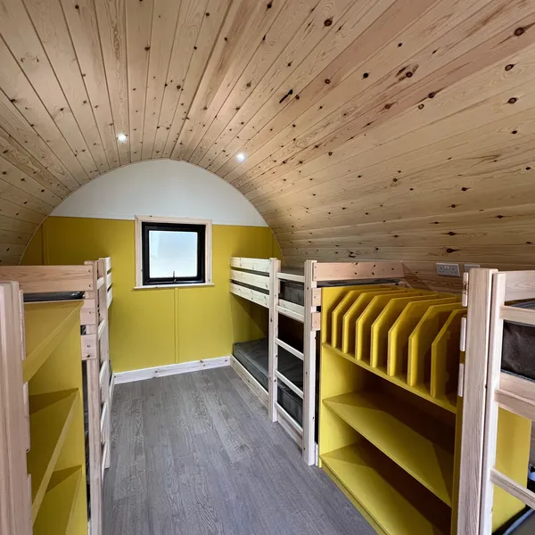 inside pupil pod with yellow wall